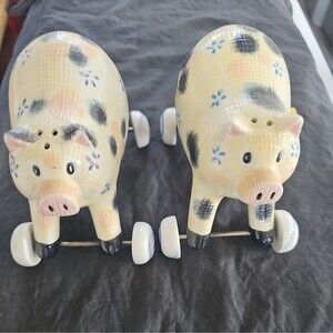 unique Pigs On Wheels  made of porcelain Salt and Pepper Shakers